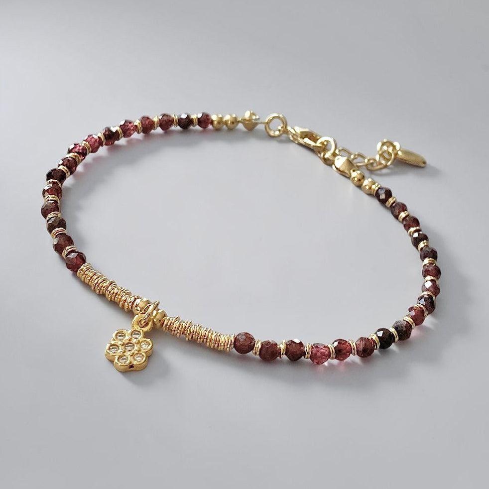 Pulsera margarita granates oro