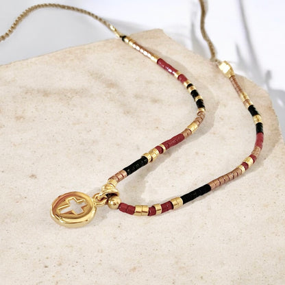 Collar tejido mini cruz calada oro