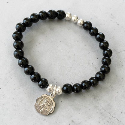 Pulsera ónix San Benito Abad plata