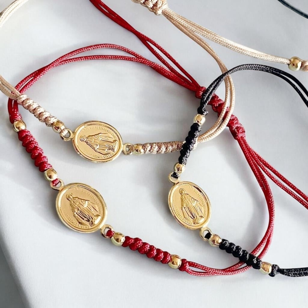 Pulsera hilo Virgen de los Rayos oro