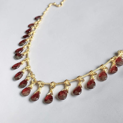 Collar granate oro