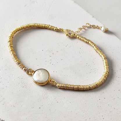 Pulsera mostacillas perla oro