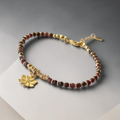 Pulsera flor granates oro