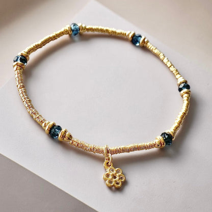 Pulsera cristal azul margarita oro