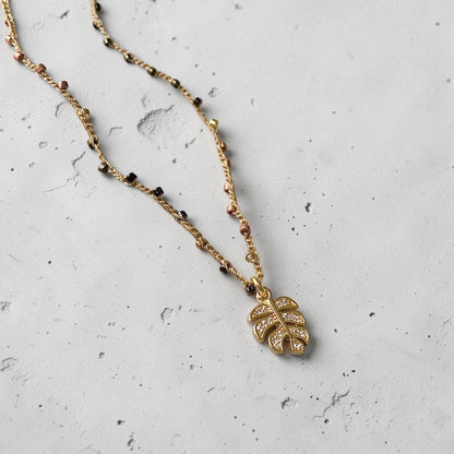 Collar tejido hojita oro