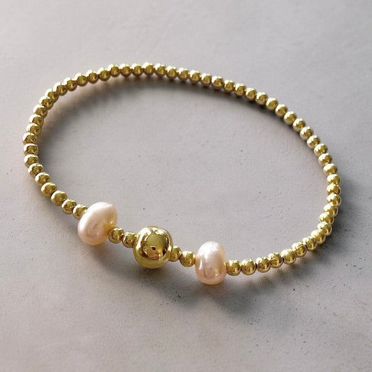 Pulsera dos perlas de río oro