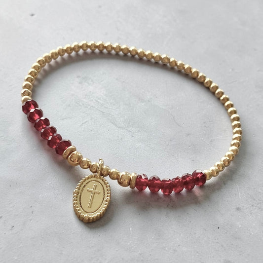 Pulsera vino cruz oro