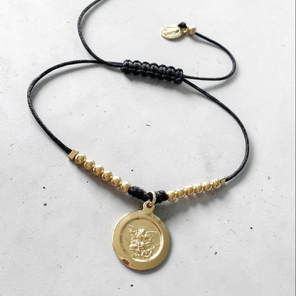 Pulsera hilo Arcángel Miguel oro