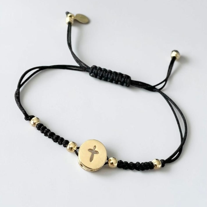Pulsera hilo cruz calada oro