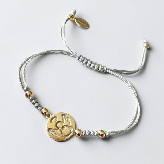 Pulsera hilo gris angelito oro