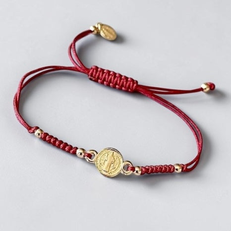 Pulsera hilo San Benito oro