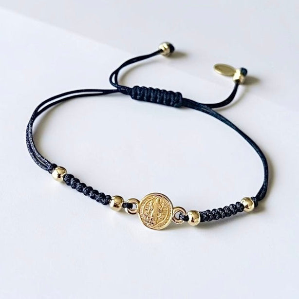 Pulsera hilo San Benito oro