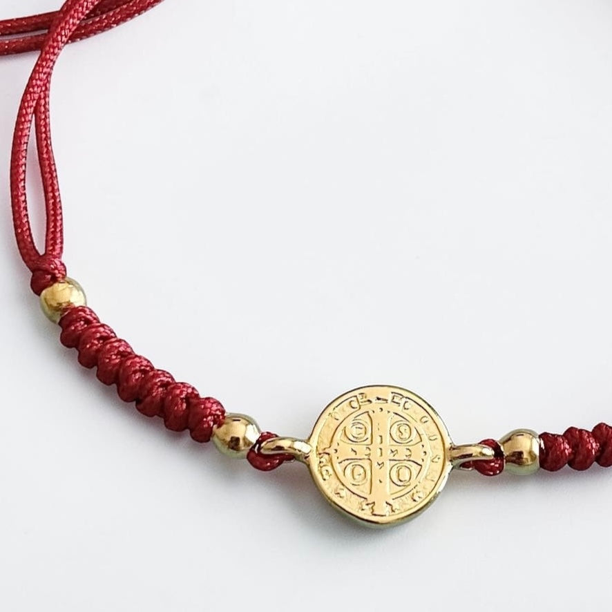 Pulsera hilo San Benito oro