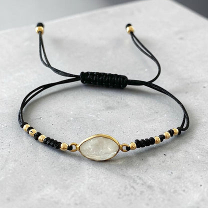 Pulsera hilo piedra luna oro