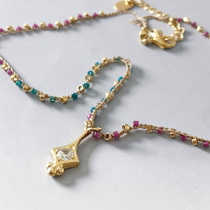 Collar tejido france oro