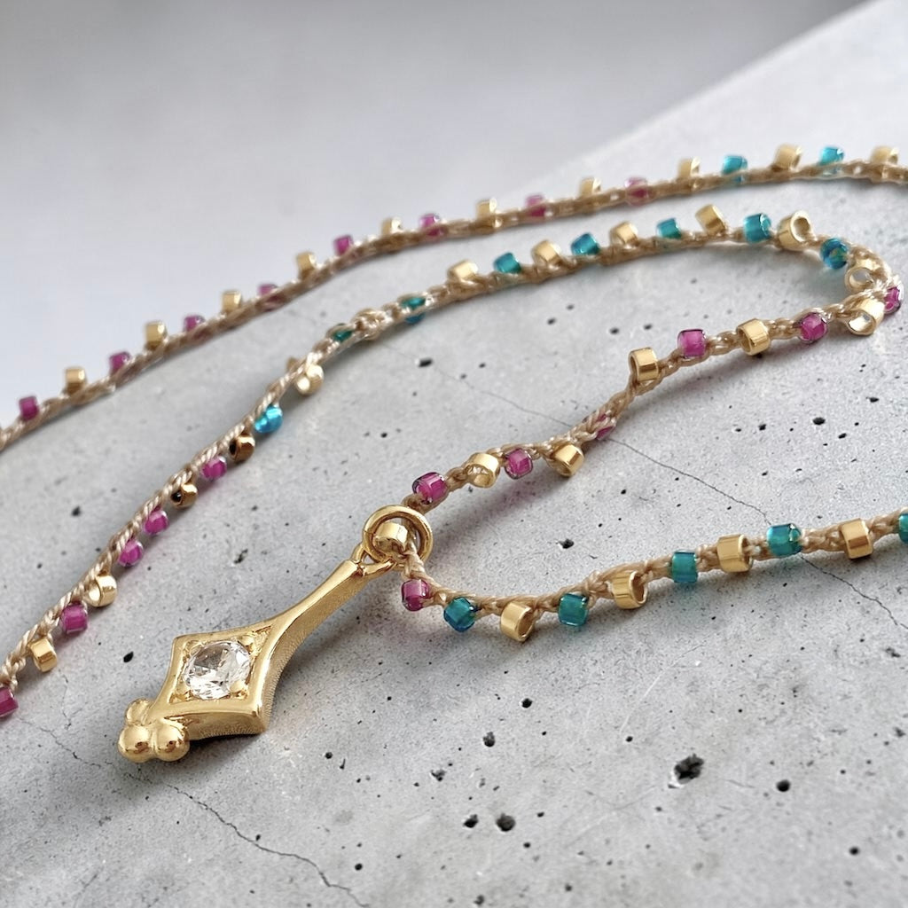 Collar tejido france oro