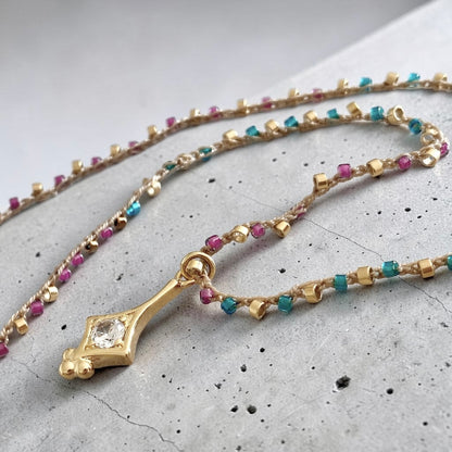 Collar tejido france oro