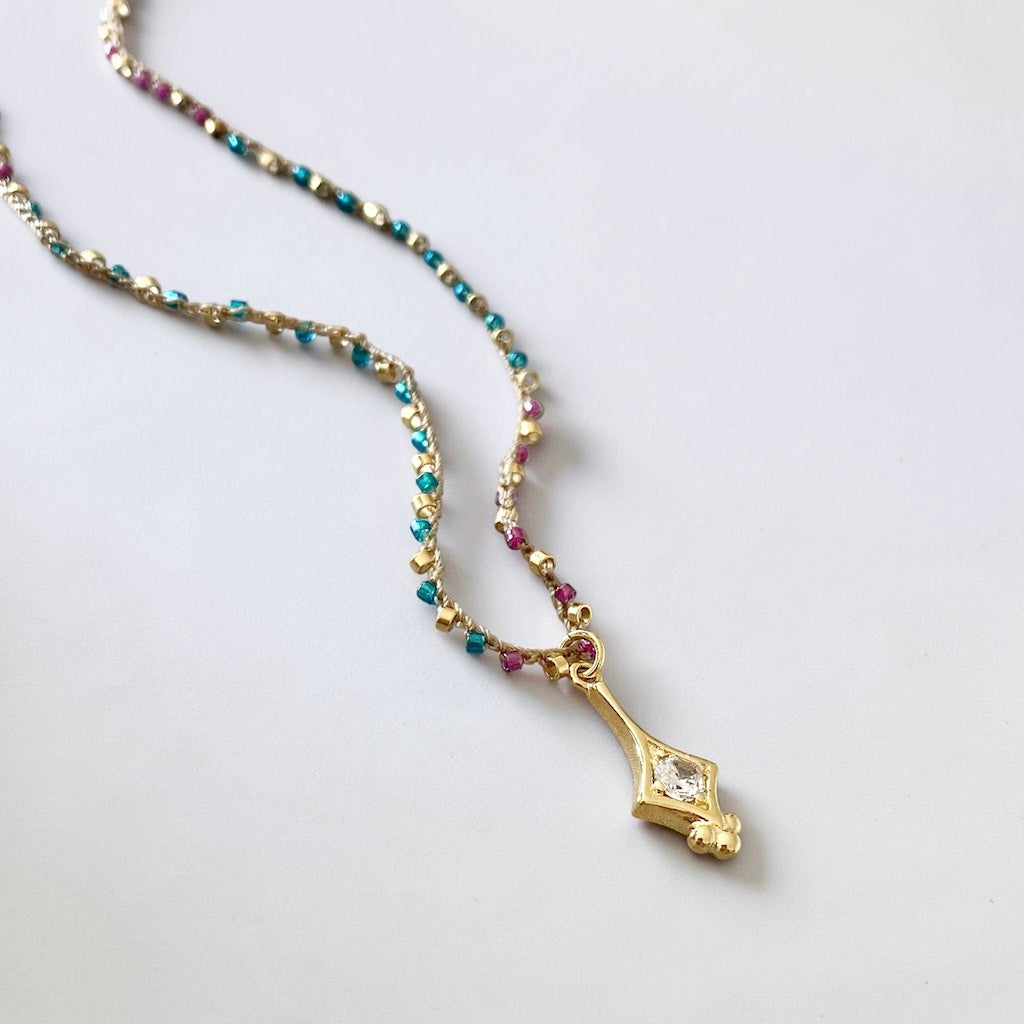 Collar tejido france oro