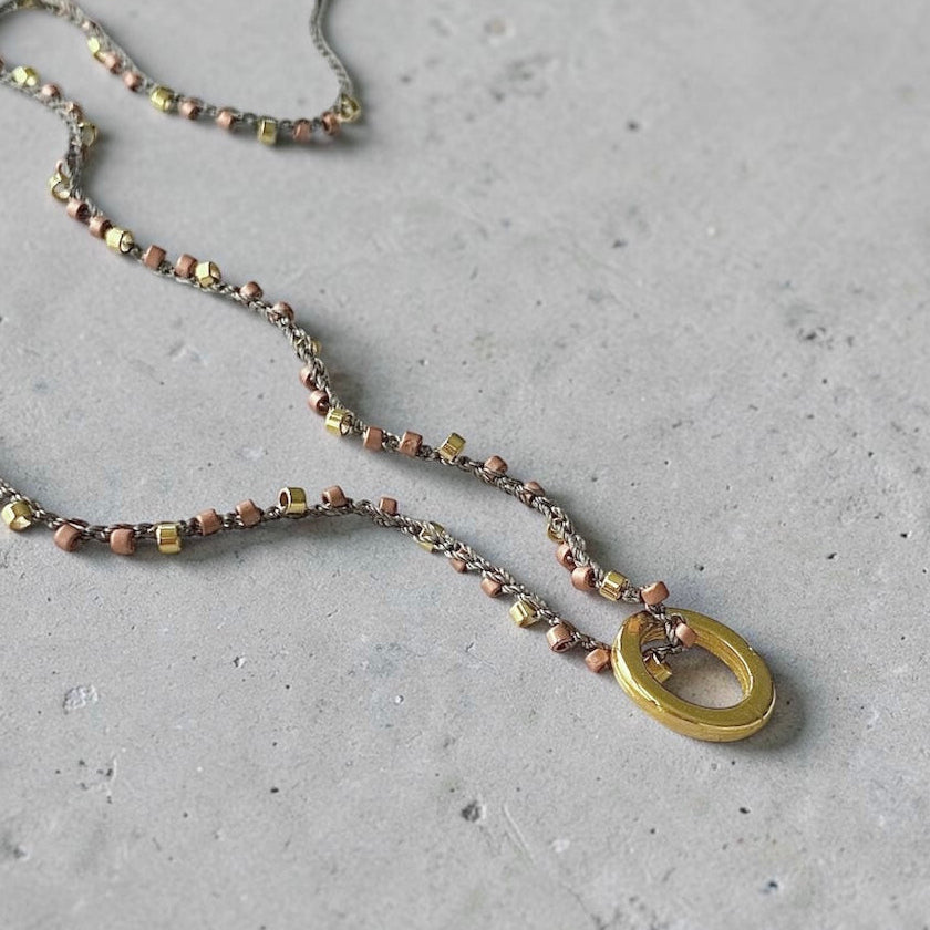 Collar tejido argolla oro