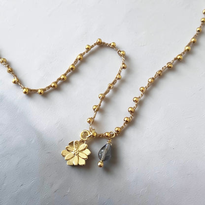 Collar tejido iolita flor oro