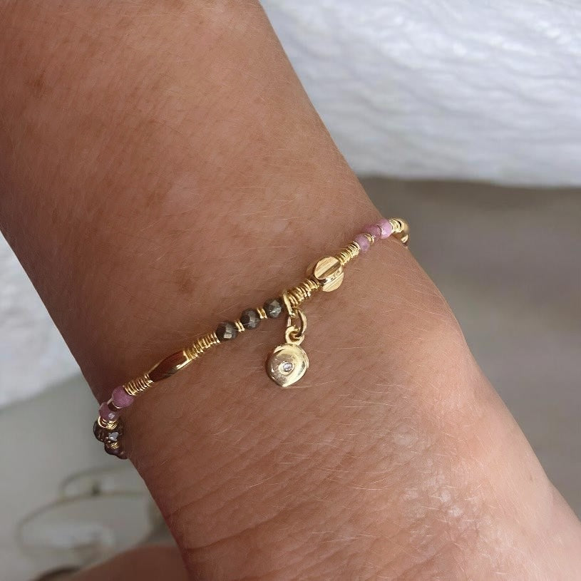 Pulsera piedras disco oro
