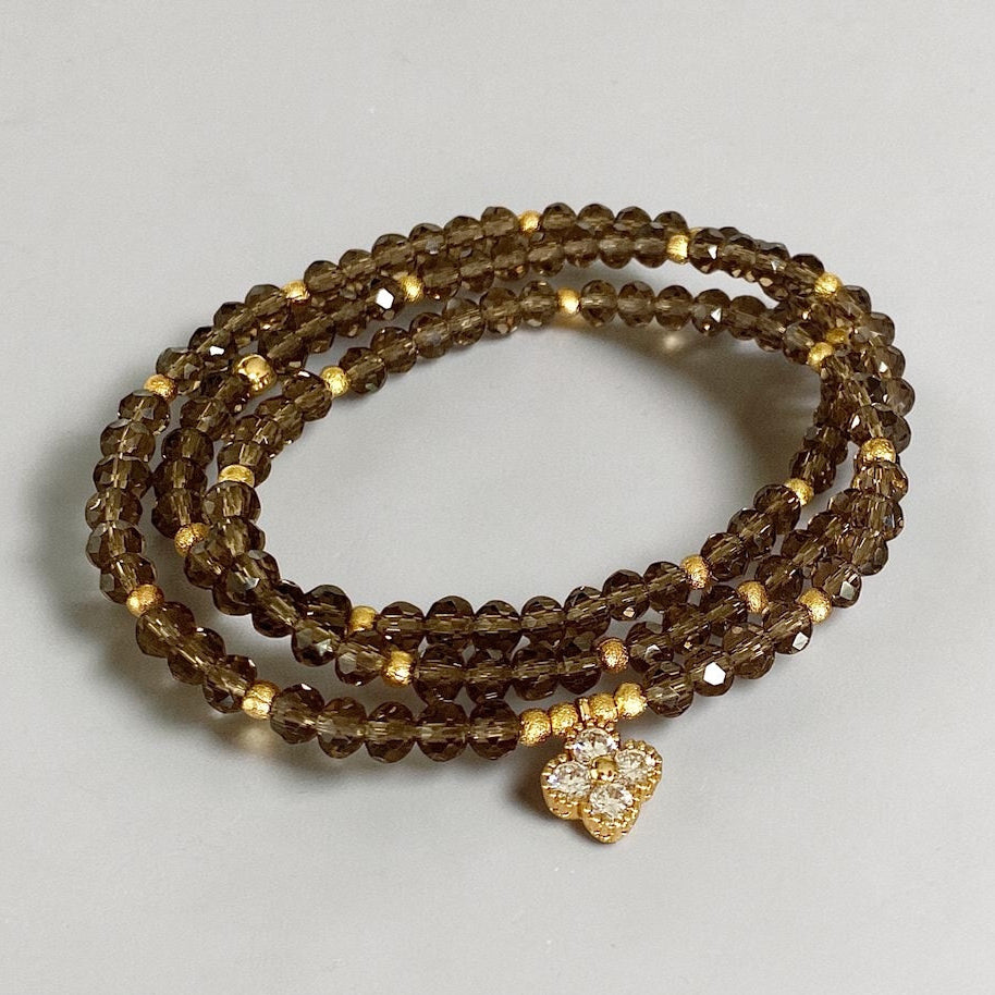 Pulsera cristales fumé oro