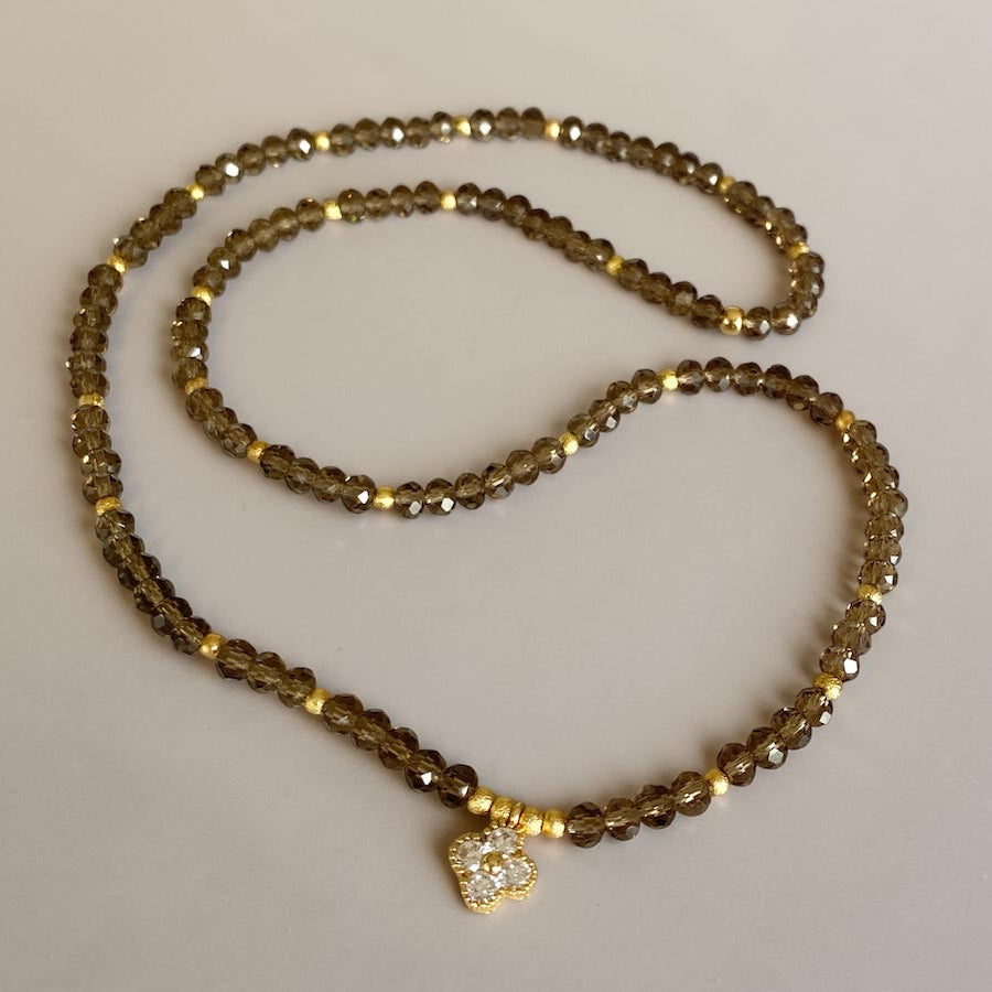 Pulsera cristales fumé oro
