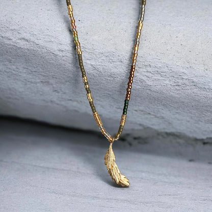 Collar etro plumita oro