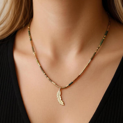 Collar etro plumita oro