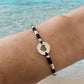 Pulsera hilo corazón calado plata