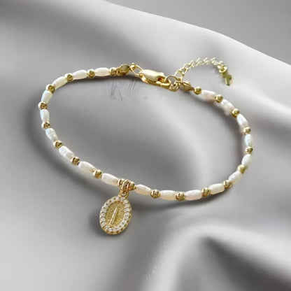 Pulsera perlas virgen oro