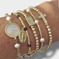 Pulsera cruz cuadrada circones oro