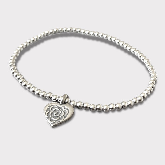 Pulsera corazón estampado plata