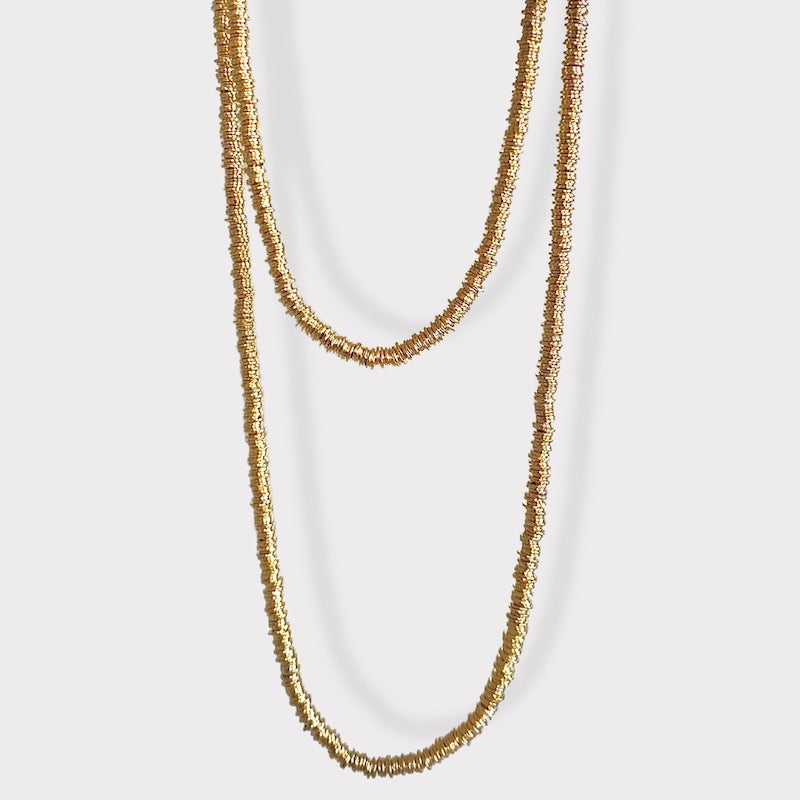 Collar mostacillas argollitas 125 cm. oro