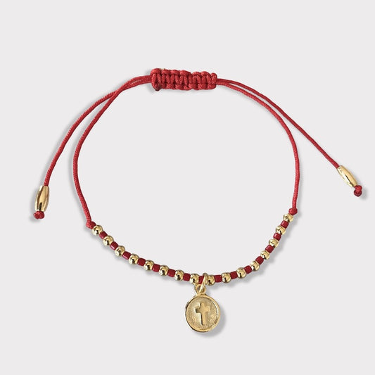 Pulsera hilo cruz relieve oro