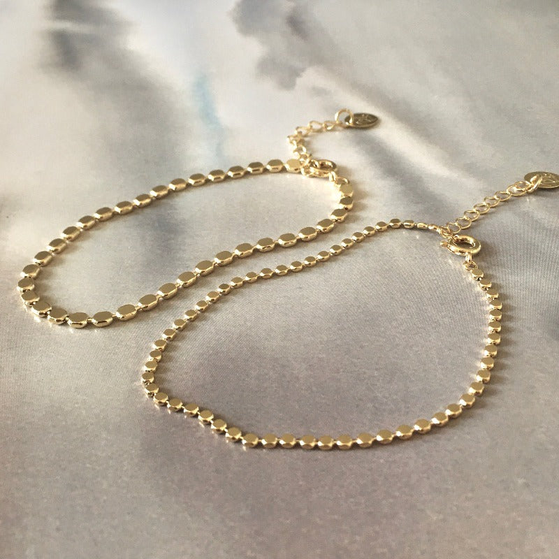 pulsera bolitas planas oro