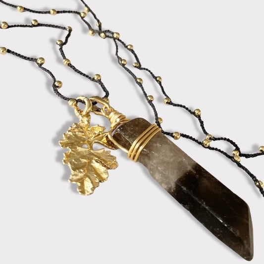 Collar tejido fumé oro