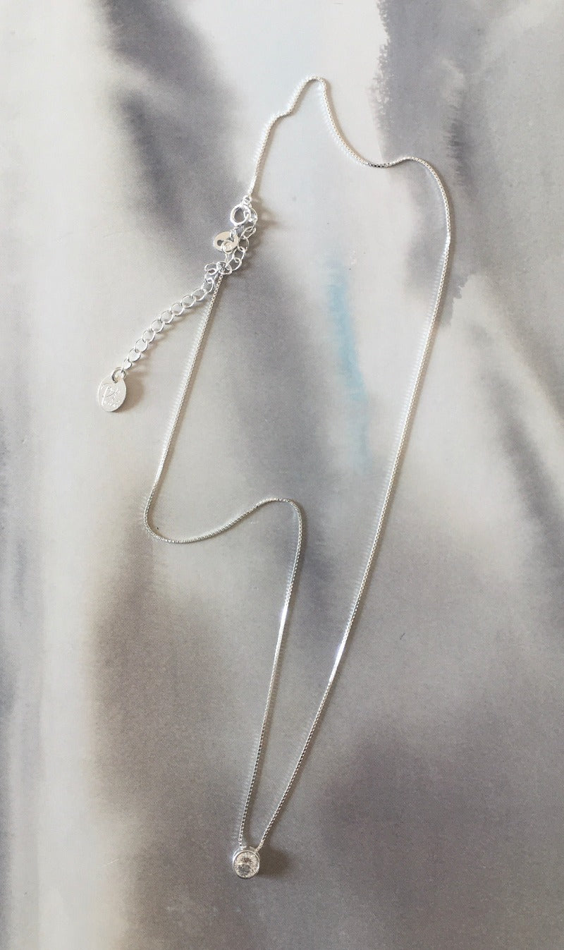 Collar punto de luz plata