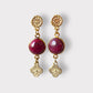 Aros raíz de rubí cabuchón oro