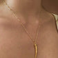 Collar colmillo oro
