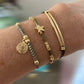 Pulsera hilo doble barra oro