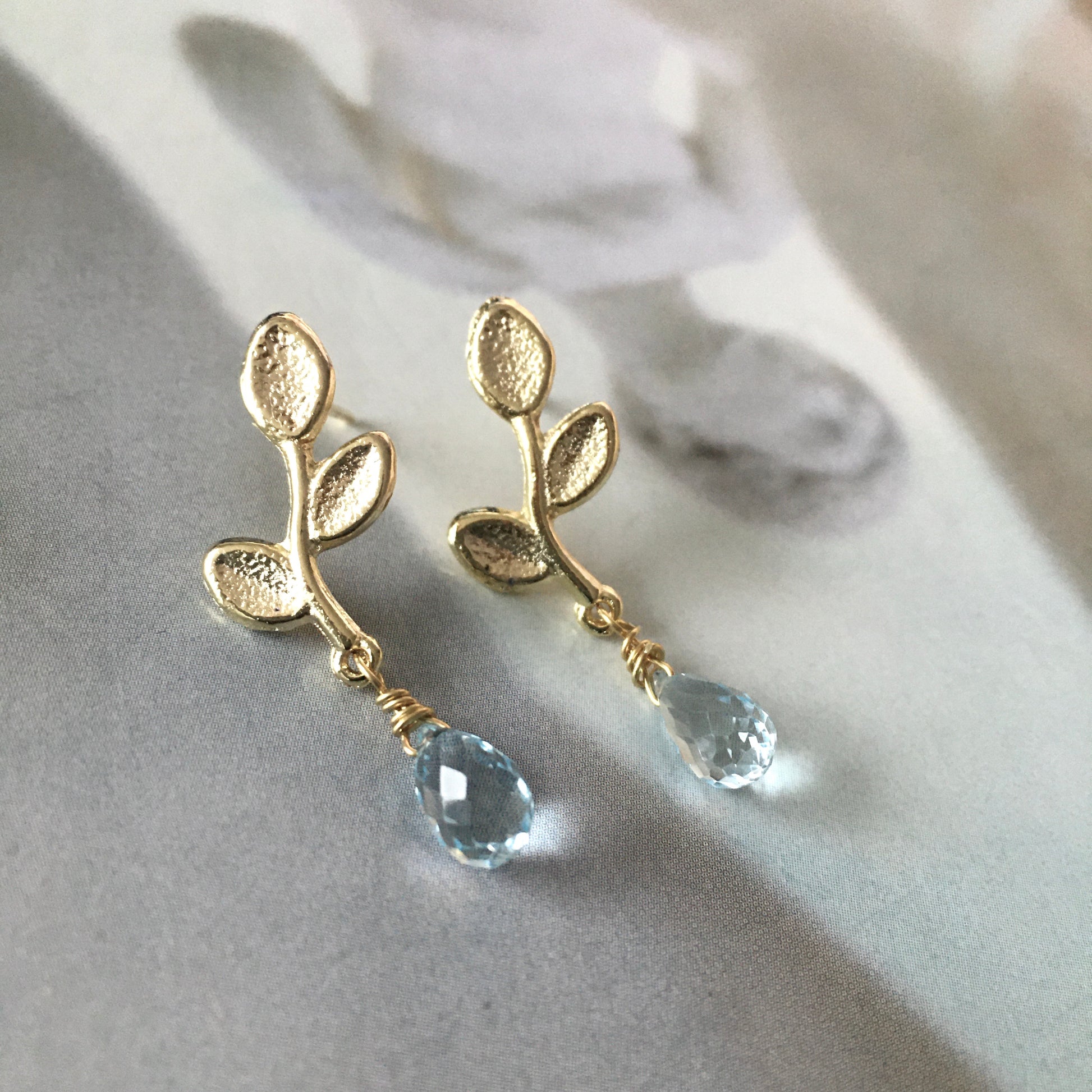 aros brote aguamarina oro